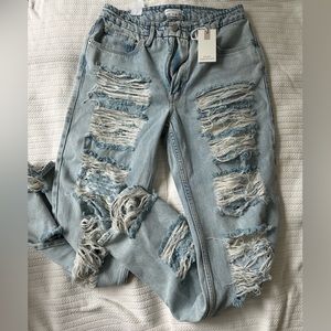Good American 90’s extreme ripped Jeans